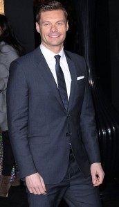 Navy suit and tie worn by Ryan Seacrest
